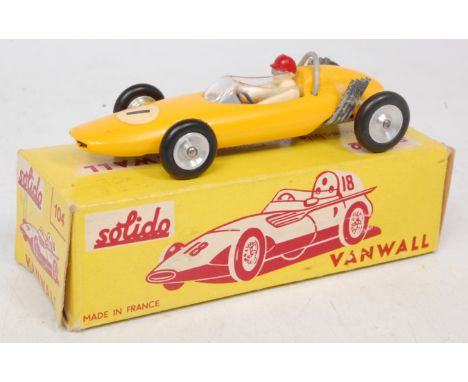 Solido, V8 BRM Racing Car, yellow body, with RN1, white driver with red helmet, spun hubs, in a Solido No.104 Vanwall Box (VG