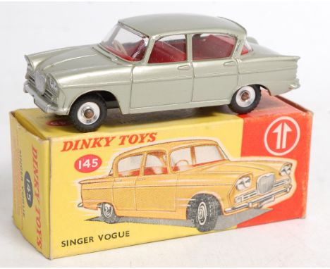 Dinky Toys, 145 Singer Vogue, light metallic green body with red interior, silver detailed grille with spun hubs and black ty