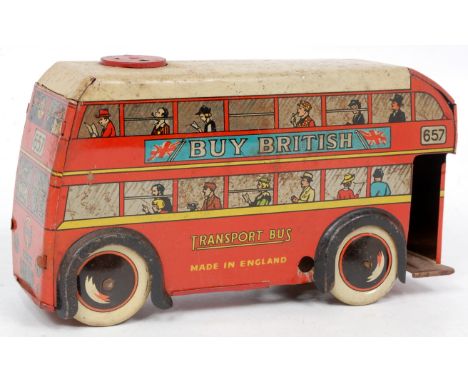 Wells Brimtoy large tinplate trolley bus, red with white roof and detailed tinprinted sides, missing red trolley poles to roo