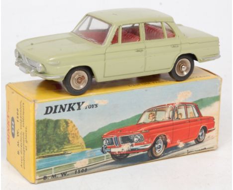 French Dinky No.534 BMW 1500, sage green body with red interior, silver trim and concave hubs, in the original all card pictu