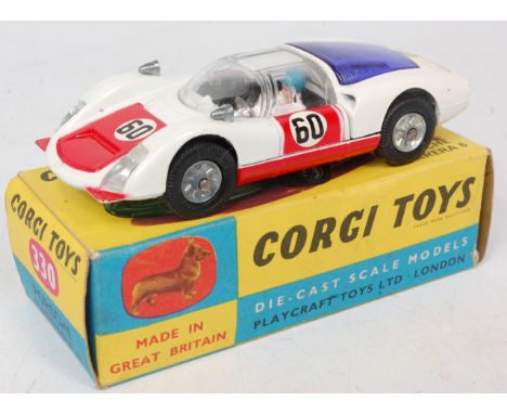 Corgi Toys, 330, Porsche Carrera 6, white body, red bonnet and doors, racing number 60, cast hubs, blue engine cover, in the 