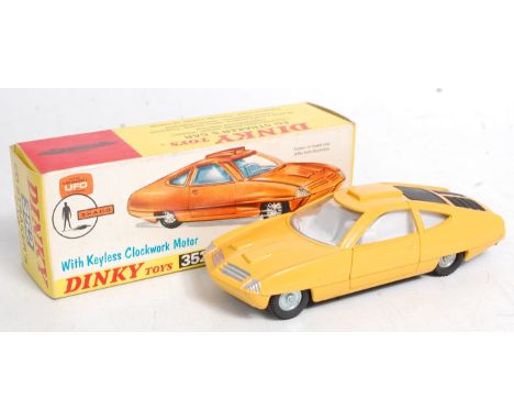 Dinky Toys, 352, Ed Straker's Car, yellow body with pale grey interior with black engine cover, in the original all card pict