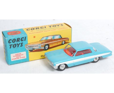 Corgi Toys, 235, Oldsmobile Super 88, light blue body, red interior with white side flash, spun hubs with black tyres, in the
