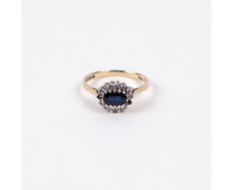 9ct gold ring with sapphire and diamond chip setting (some stones missing)