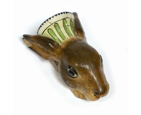 Turner pottery stirrup cup circa 1800, modelled as a hare, the coat in shades of brown, decorated in pearl ware, impressed ma