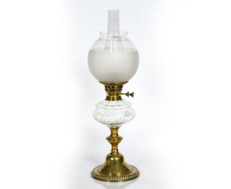 Brass and glass oil lamp Victorian, with clear glass reservoir, supported by a brass column,"English Made Duplex", 52.5cm hig
