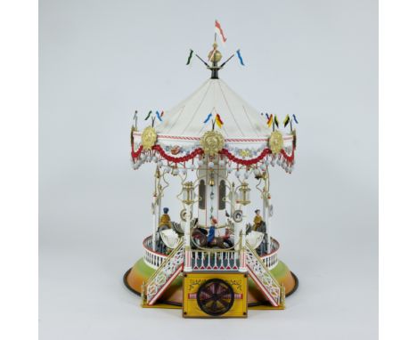 Toy electric carousel by Gebr. Märklin &amp; Cie, Göppingen, reissue year 2000 model 1900, with 8 dolls, with certificateSpee