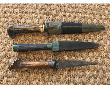 Three 19th Century hunting knives, (two having their blades seized in scabbards)