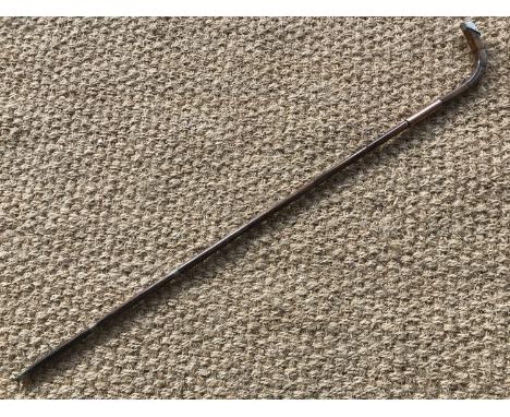 A Victorian palm wood sword stick, having white metal pommel, the lozenge-section blade bearing etched foliate scroll decorat