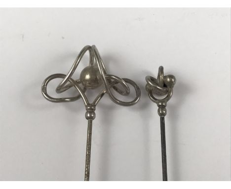 Two Edwardian Charles Horner silver ribbon and ball hat pins, Chester, 1907 and 1908 