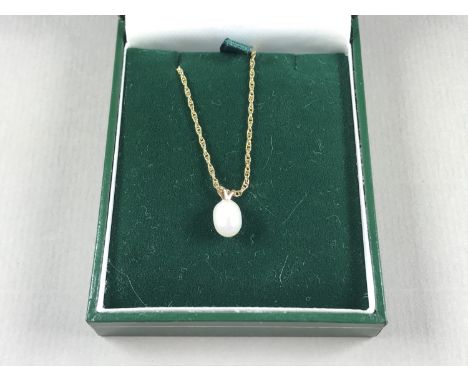 A contemporary pearl pendant necklace, suspended on a fancy-link yellow-metal neck chain, stamped 375