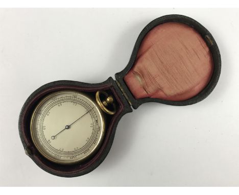 A late 19th Century cased pocket aneroid barometer 