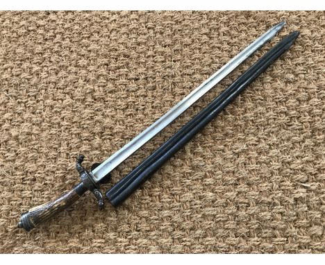 An early 19th Century German hunting dagger, having steel hilt with antler grip, 54 cm