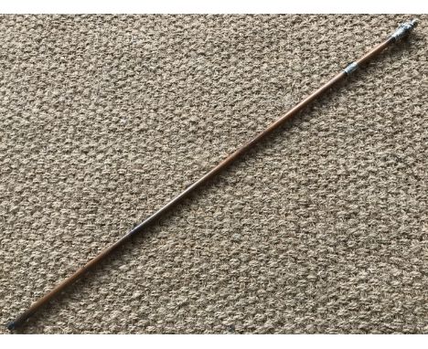 An antique cane sword stick, having tapering hexagonal-section blade, nickel ferrule bearing chased and engraved foliate deco