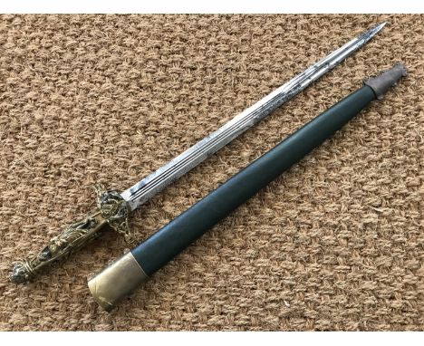 A mid 19th Century exhibition quality French presentation short sword, the parcel-gilt and silvered brass hilt elaborately ca