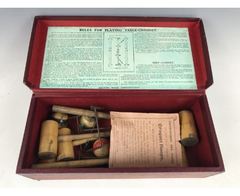 An early 20th Century Chad Valley Table Croquet set, in original carton with instructions 