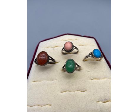 Four vintage silver 925 ladies rings set with various gem stones which includes agate. 