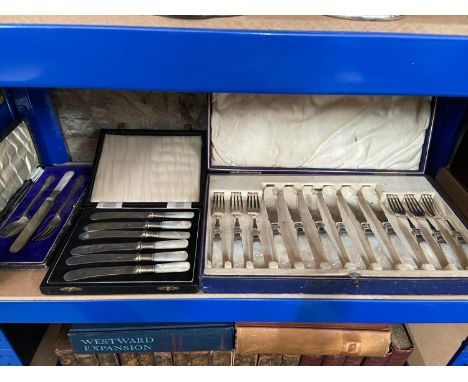 Three various boxed cutlery sets all designed with mother of pearl handles. 