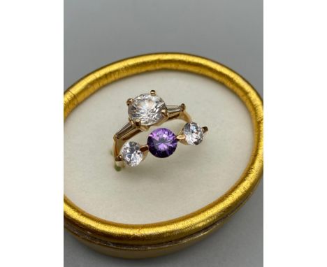 A Ladies vintage 14ct gold ring set with three large clear stones, Ring size R [3.01 Grams] together with a gold coloured rin