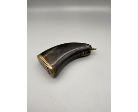 A 18th/ 19th century gun powder flask in the shape of a gun handle. Made from horn with brass mounts. [9cm length] Engraved w