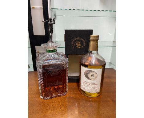 A Crystal Bowmore Scotch Whisky decanter with pewter golfer stopper. Together with a Vintage 1974 single Islay malt scotch wh