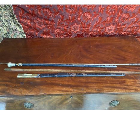 A Royal corps signals swagger stick, Imperial Area measuring stick, Sword scabbard and gun cleaning rod. 