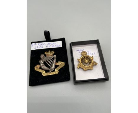 Two antique military badges. 8th Kings Royal Irish Hussars cap badge and Army Cyclist Corps badge. 