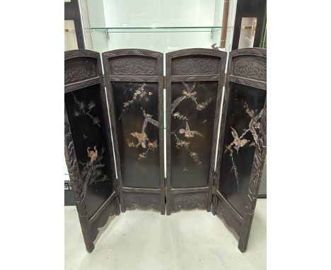 A 19th century Japanese four section screen. Depicting paua shell inlaid birds against a black lacquered back drop. [Height 9