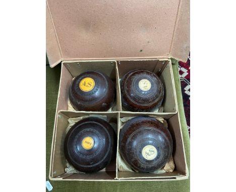 A Set of four vintage wooden bowls by Thomas Taylor Glasgow. Complete with original box. 