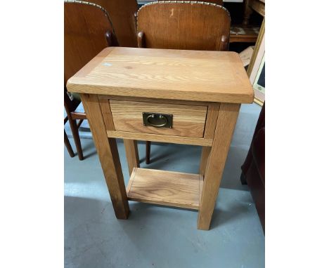 A Contemporary light oak one drawer console table. [75x50x32cm] 