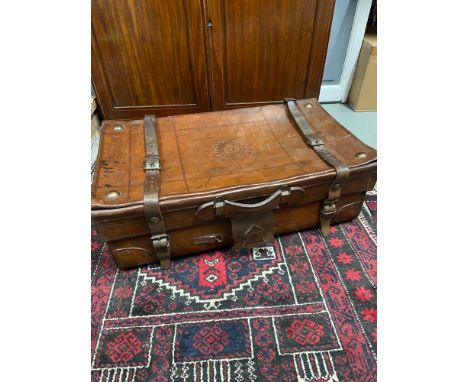 A Really nice example of a vintage brown leather travel case, Designed with metal studs, leather work and leather straps. Has