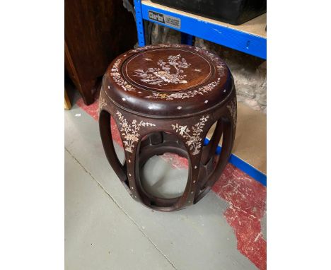 A 20th century Oriental hardwood and mother of pearl inlaid stool. [45cm height] 