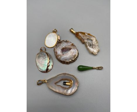 A Lot of 6 precious gem stone pendant, Three surrounded by possible gold mounts, Jade and gold toned hoop pendant, Precious s