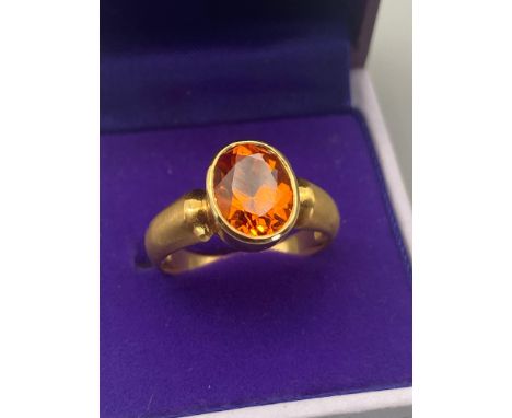 A Beautiful example of An 800 gold Portuguese hallmarked ladies ring set with a large  Golden Synthetic Sapphire, Oval facete