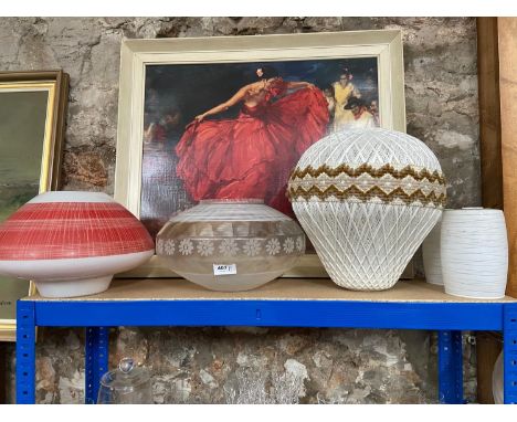 A Lot of retro and vintage light shades which includes hot air balloon style weaved shade &amp; UFO Red and white shade 