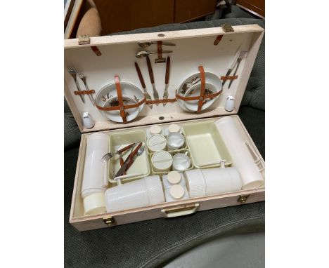 A Vintage picnic carry case and contents. 