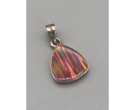 A Vintage Mayan Art 950 silver &amp; Red Mexican Fire Opal stone pendant. Opal measures 1.9x1.6cm at the widest points. 