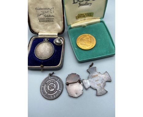 A quantity of vintage medals which includes Birmingham silver Scottish Command Cup Final SGMN Sutherland 1942 medal with box,