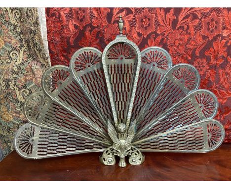 A Vintage fan design brass fire screen. 