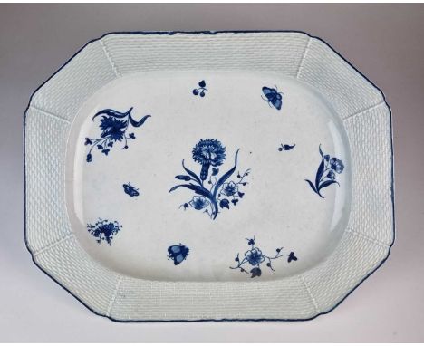An octagonal Worcester 'Gillyflower' plattercirca 1770-80the elongated form with a panelled basket-weave border, painted in u