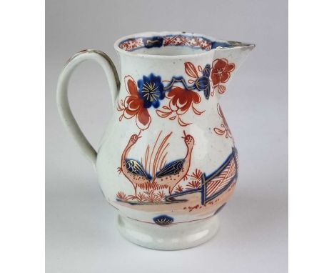 A Vauxhall porcelain jugcirca 1758painted in underglaze blue and over-glaze red enamel with gilt, the pattern featuring two b