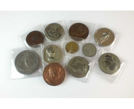 A collection of base metal Napoleonic War medals, comprising; Death of Sir John Moore 1809, Wellington Liberator of Spain &am