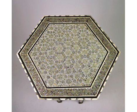 A 19th century Persian, khatamkari occasional table, inlaid with mother-of-pearl, bone, a yellow metal (possibly gold) and ro