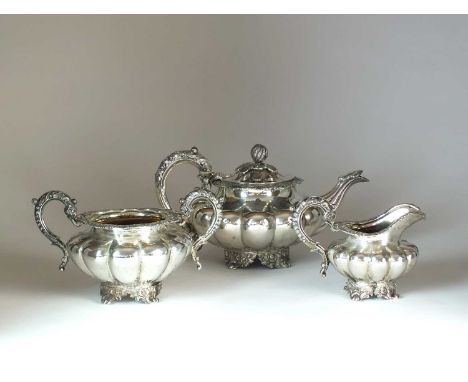 A matched three piece silver tea service, comprising; a William IV melon form teapot, Jonathan Hayne, London 1834, with styli