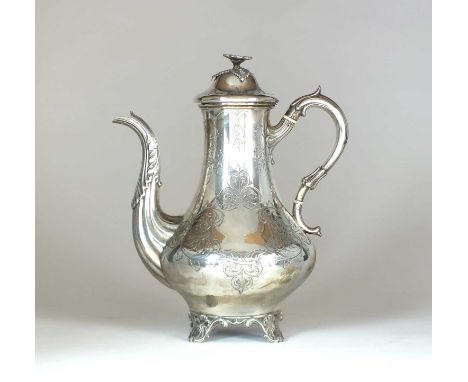 A Victorian silver coffee pot, Hawkesworth, Eyre & Co, Sheffield 1856, of baluster form with engraved floral and scroll decor