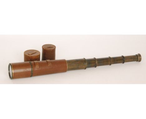 A First World War leather cased brass four drawer telescope by Broadhurst and Clarkson & Co Ltd, length 110cm    