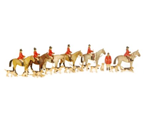 Frank Whittington (1876-1973) - A New Forest carved and painted pine hunting set comprising of horses, huntsmen and hounds 