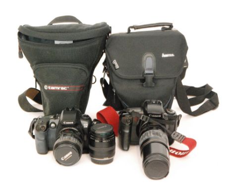 A Canon EOS D30 SLR digital camera, a similar EOS 5 SLR camera with spare 50mm lens and cases (2)   