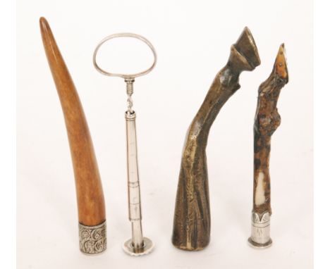 An early 19th Century silver mounted pipe tamper in the form of a horses hoof with pique work shoe, a similar bronze hoof tog