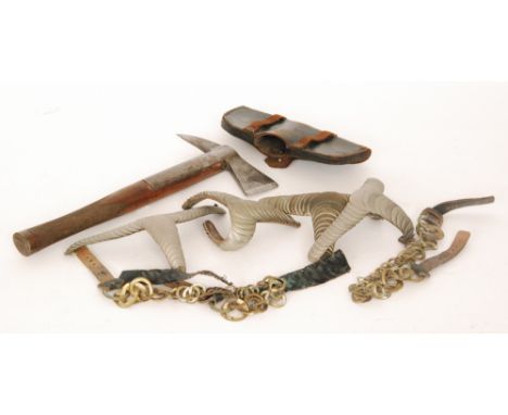 A late 19th Century officers hand axe with leather pouch, the blade stamped Shand Mason, London, together with various epaule